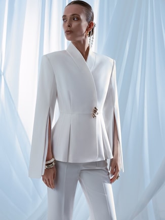 Flared jacket with slits on sleeves